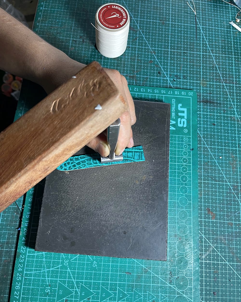Pricking a handmade leather watch strap